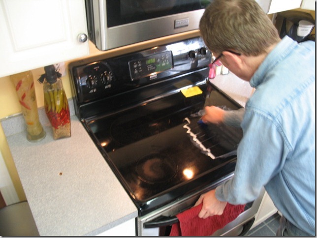 steve cleaning stove 020